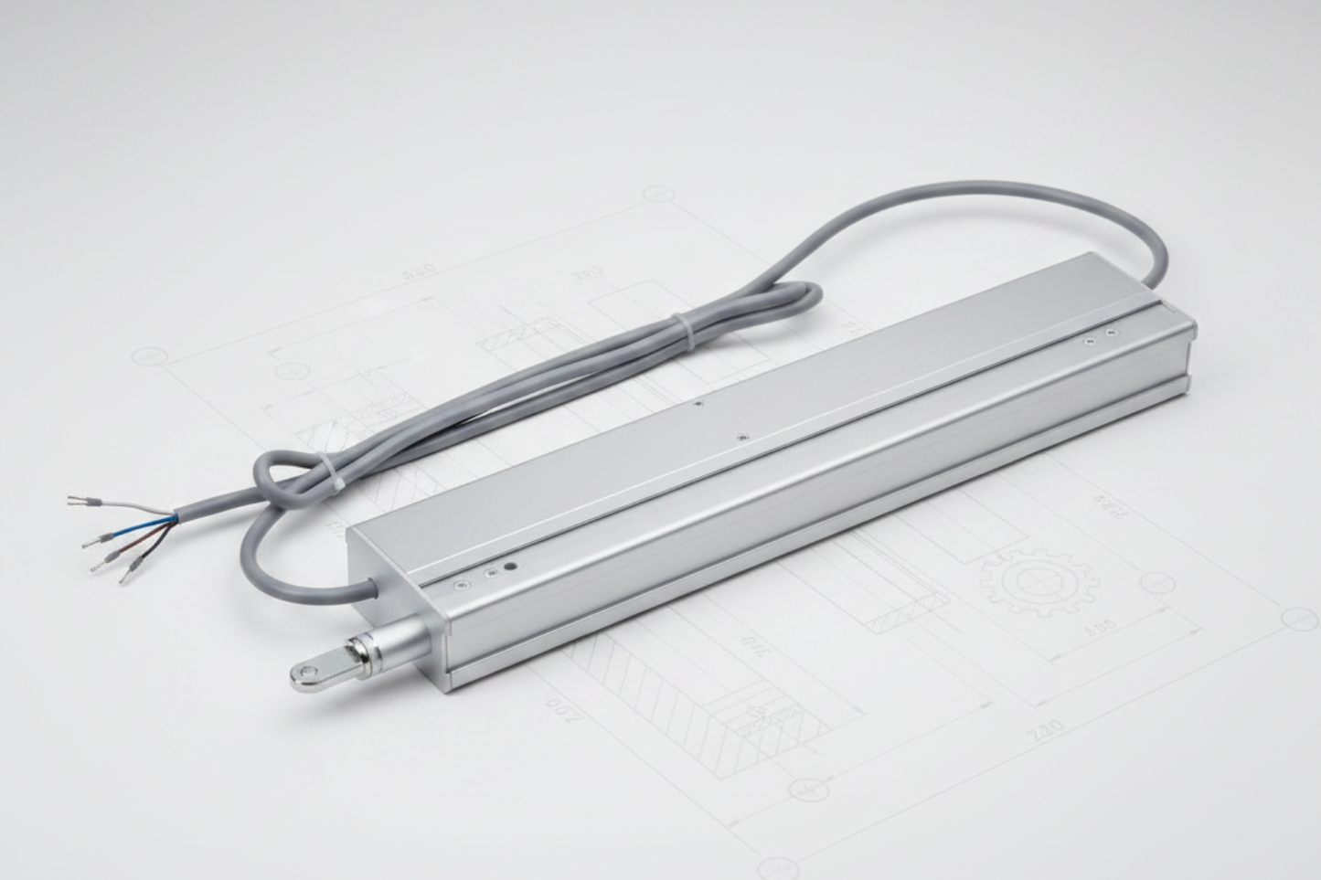 Produktabbildung des Kingspan STG Kastenspindelantriebs M3. Der elektrische Spindelantrieb verfügt über ein kompaktes Gehäuse mit ausfahrbarer Spindel und dient der automatischen Öffnung und Schließung von Fenstern, Lichtkuppeln und Lüftungselementen.