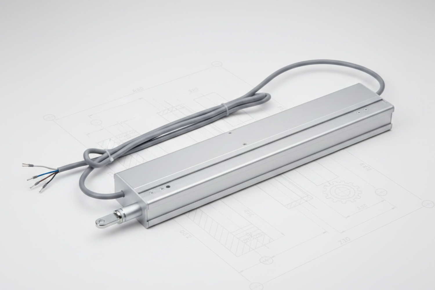 Produktabbildung des Kingspan STG Kastenspindelantriebs M3. Der elektrische Spindelantrieb verfügt über ein kompaktes Gehäuse mit ausfahrbarer Spindel und dient der automatischen Öffnung und Schließung von Fenstern, Lichtkuppeln und Lüftungselementen.